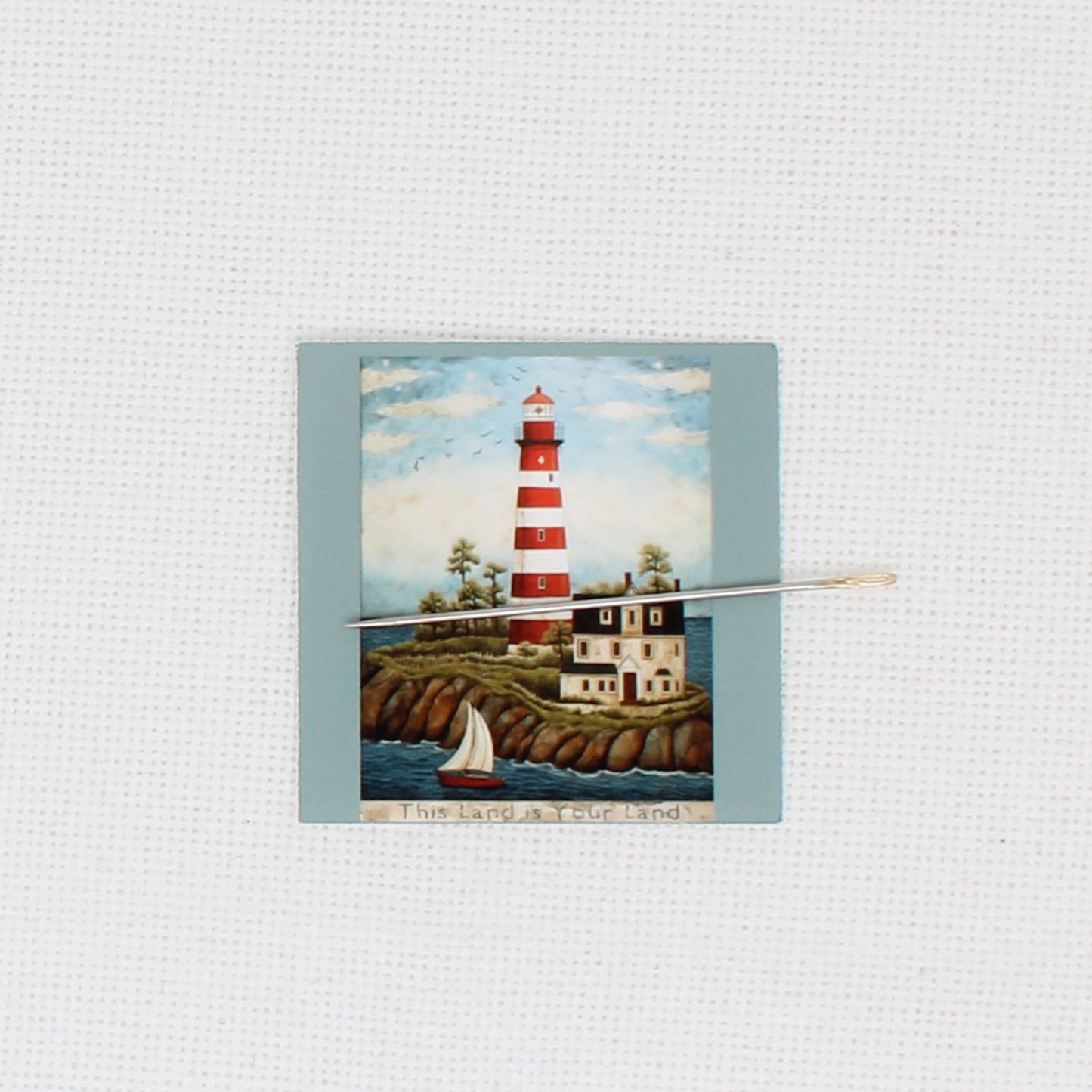This Land Is Your Land Lighthouse Needle Minder