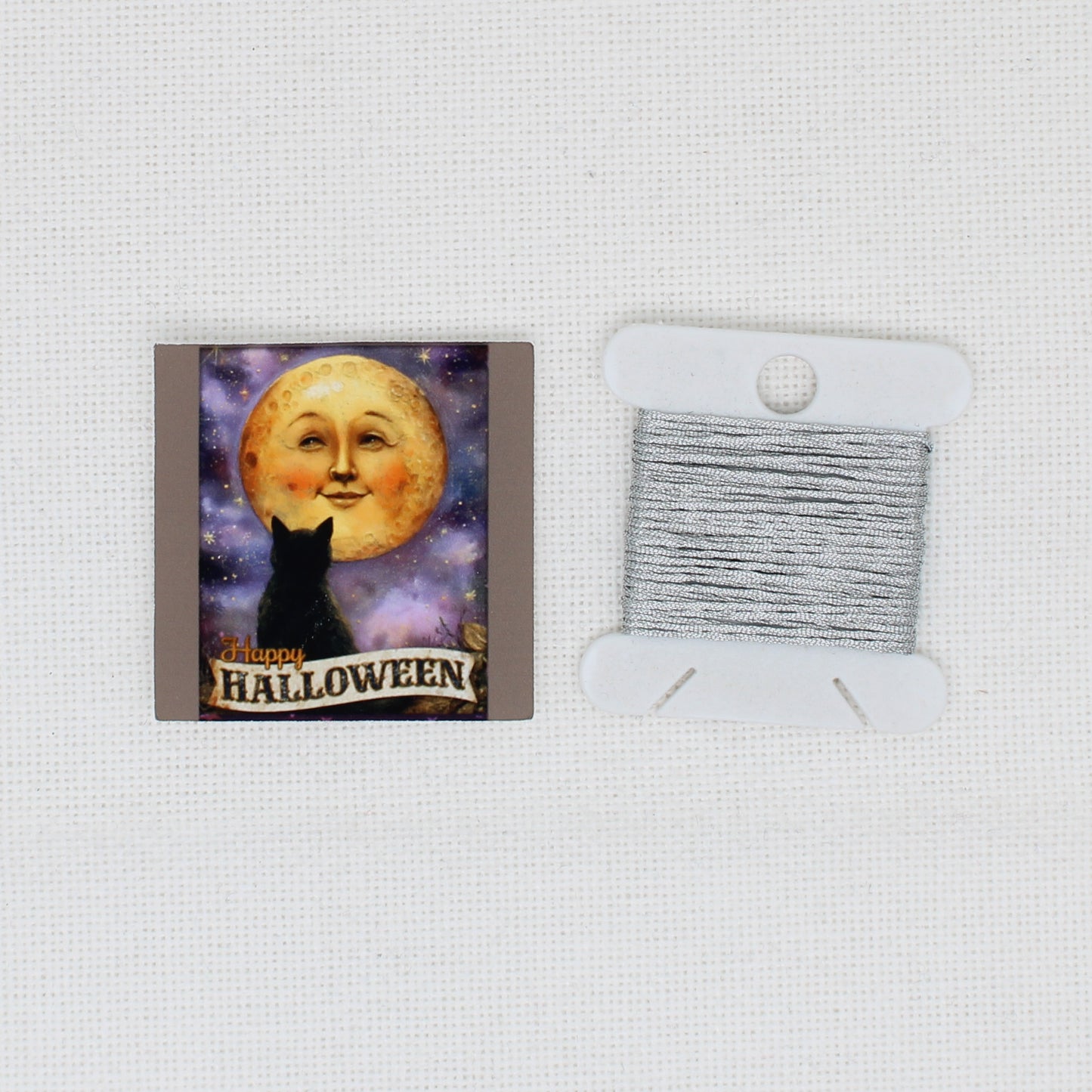 Cat And Moon Face Needle Minder
