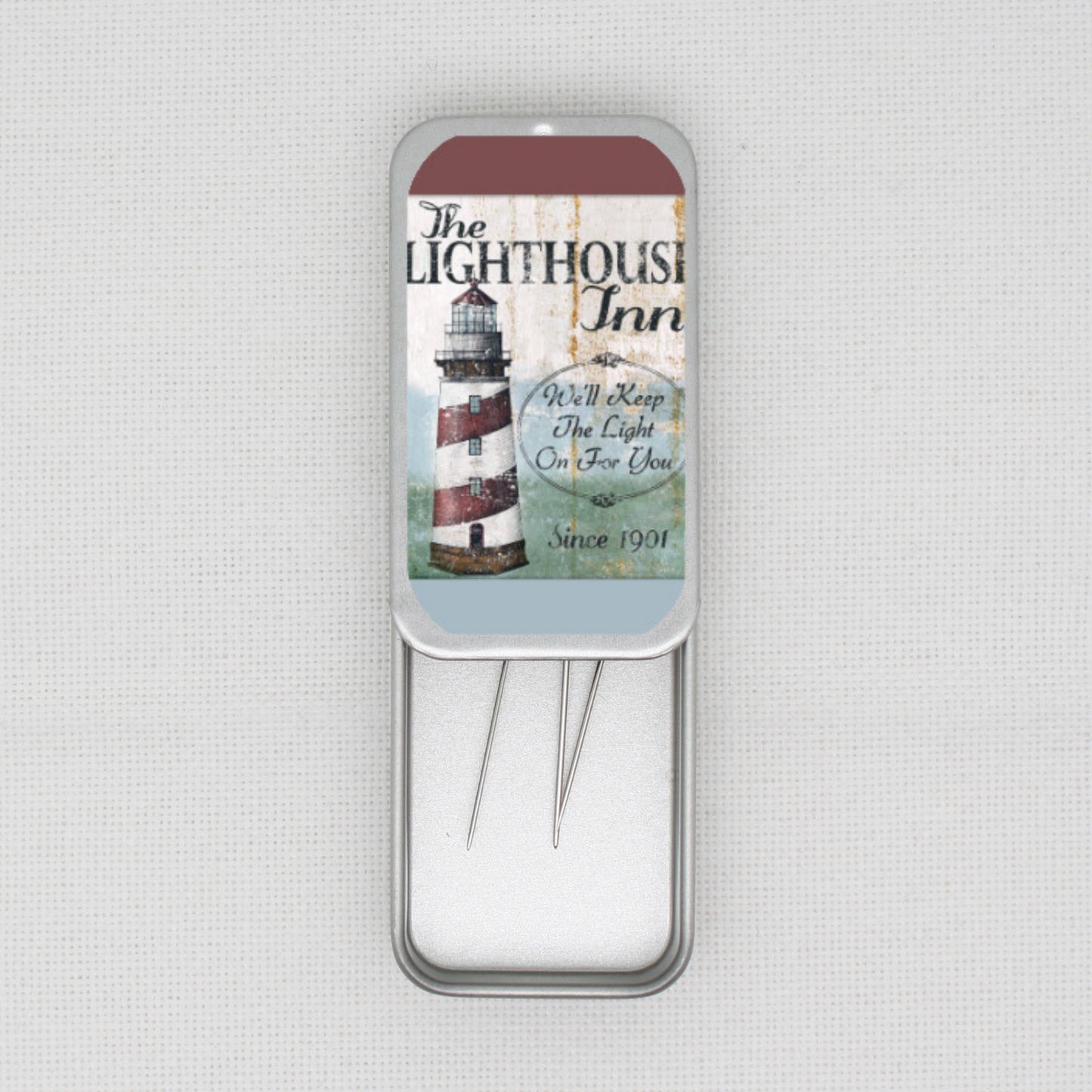 Lighthouse Inn Needle Tin