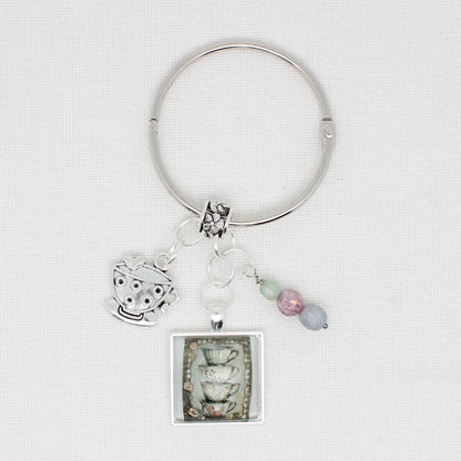 Teacups Floss Ring