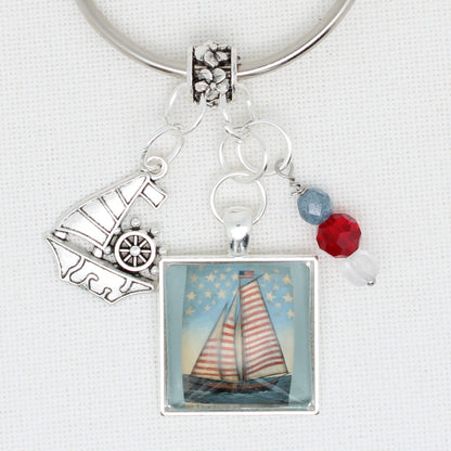 This Land Is Your Land Sailboat Floss Ring