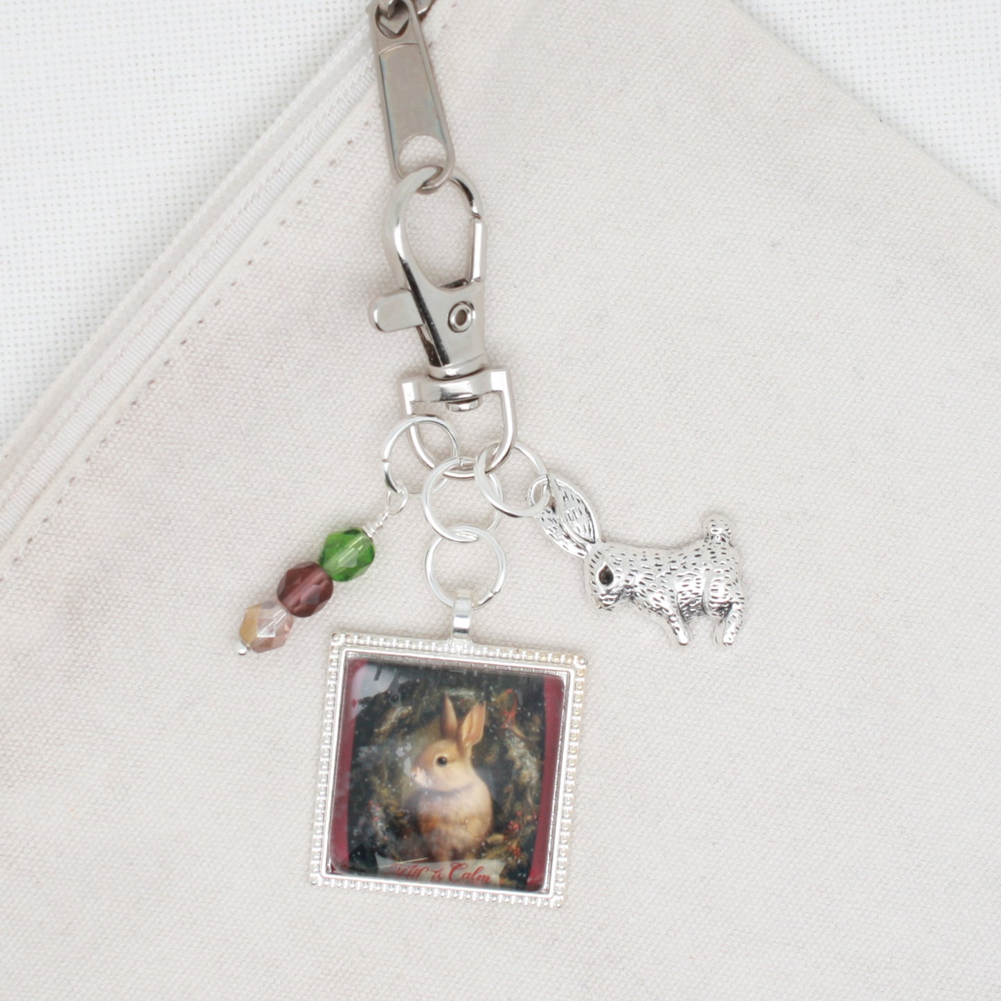 All is Calm To All Zipper Pull/ Mini- Fob